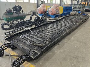 Protected drive and wear components on a coal feeder